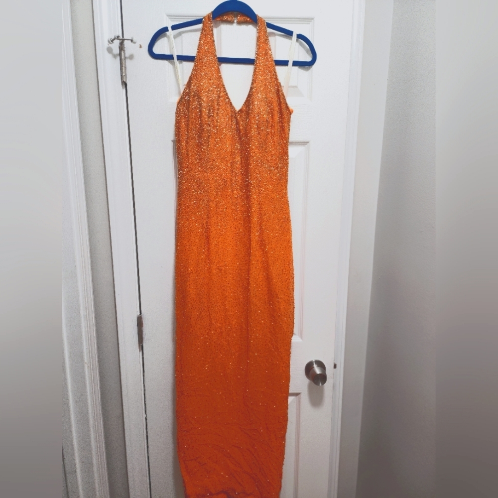 Orange beaded halter formal gown